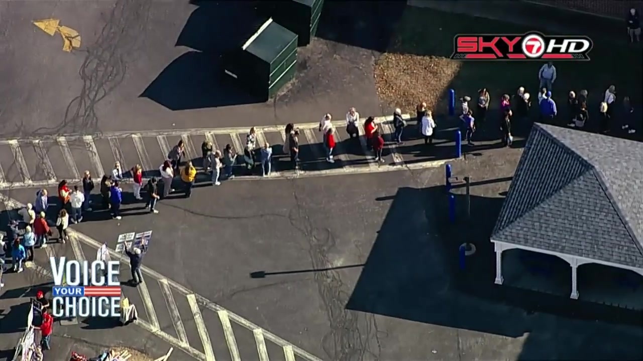 Long lines seen outside polling locations in New Hampshire Boston