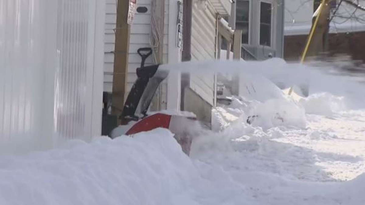 North Shore residents digging out after getting more than 8 inches of ...