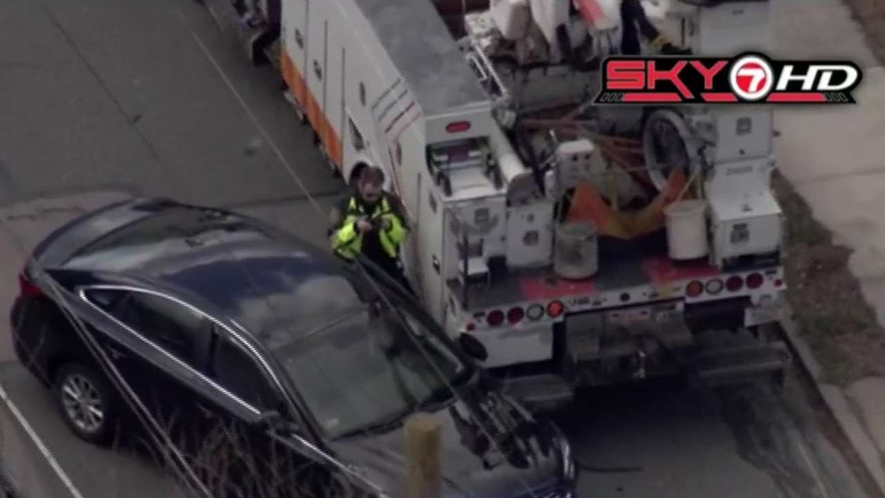 Man airlifted to hospital after becoming trapped between utility truck ...