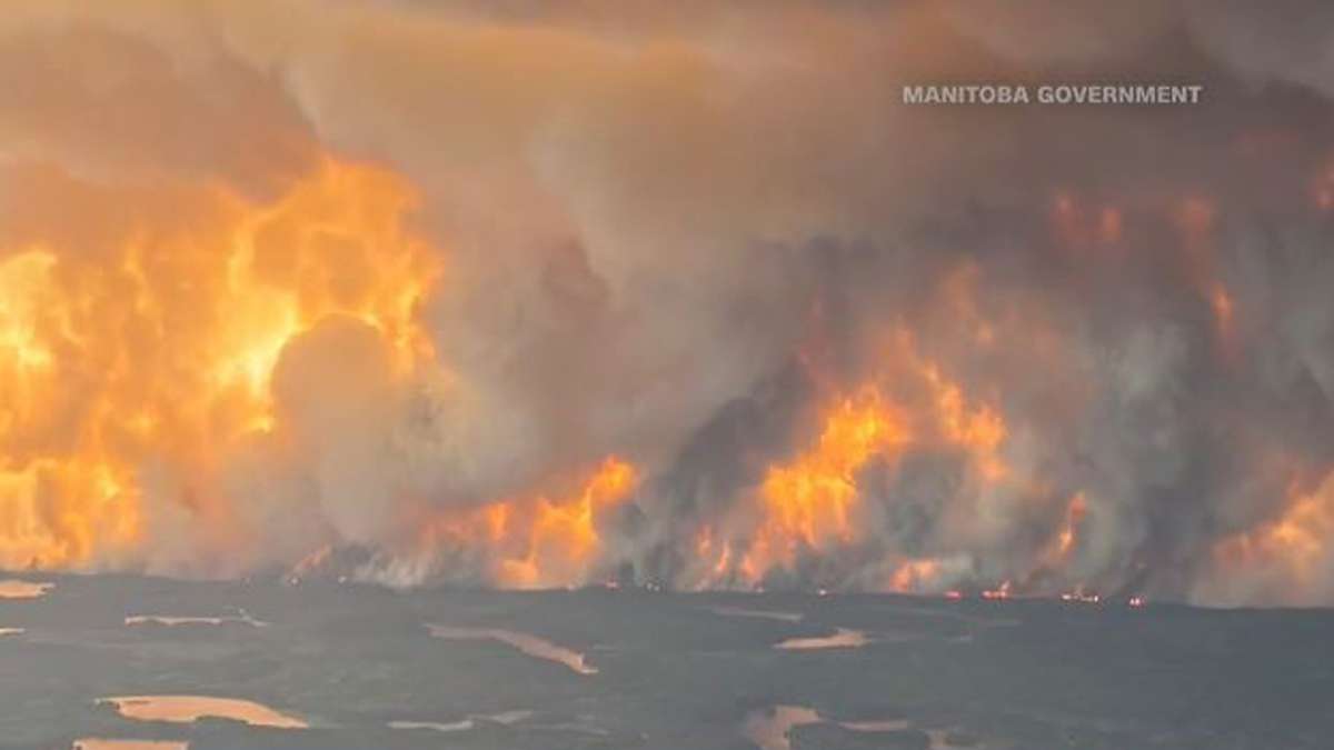 Wildfires burning across central Canada force more people to evacuate ...