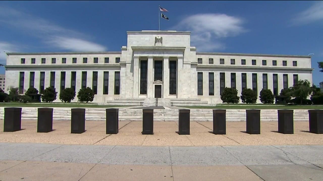 Federal Reserve keeps interest rates unchanged even as Trump continues ...