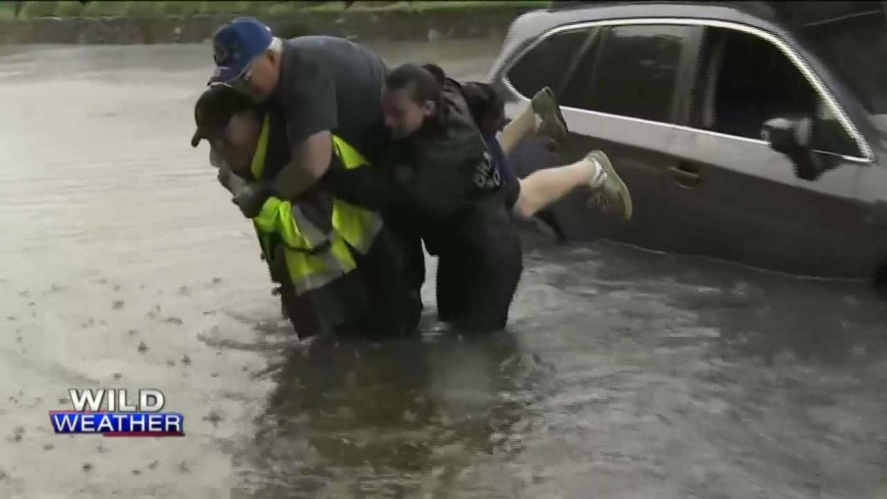 Police officer helps veteran escape his car in flooded Braintree ...