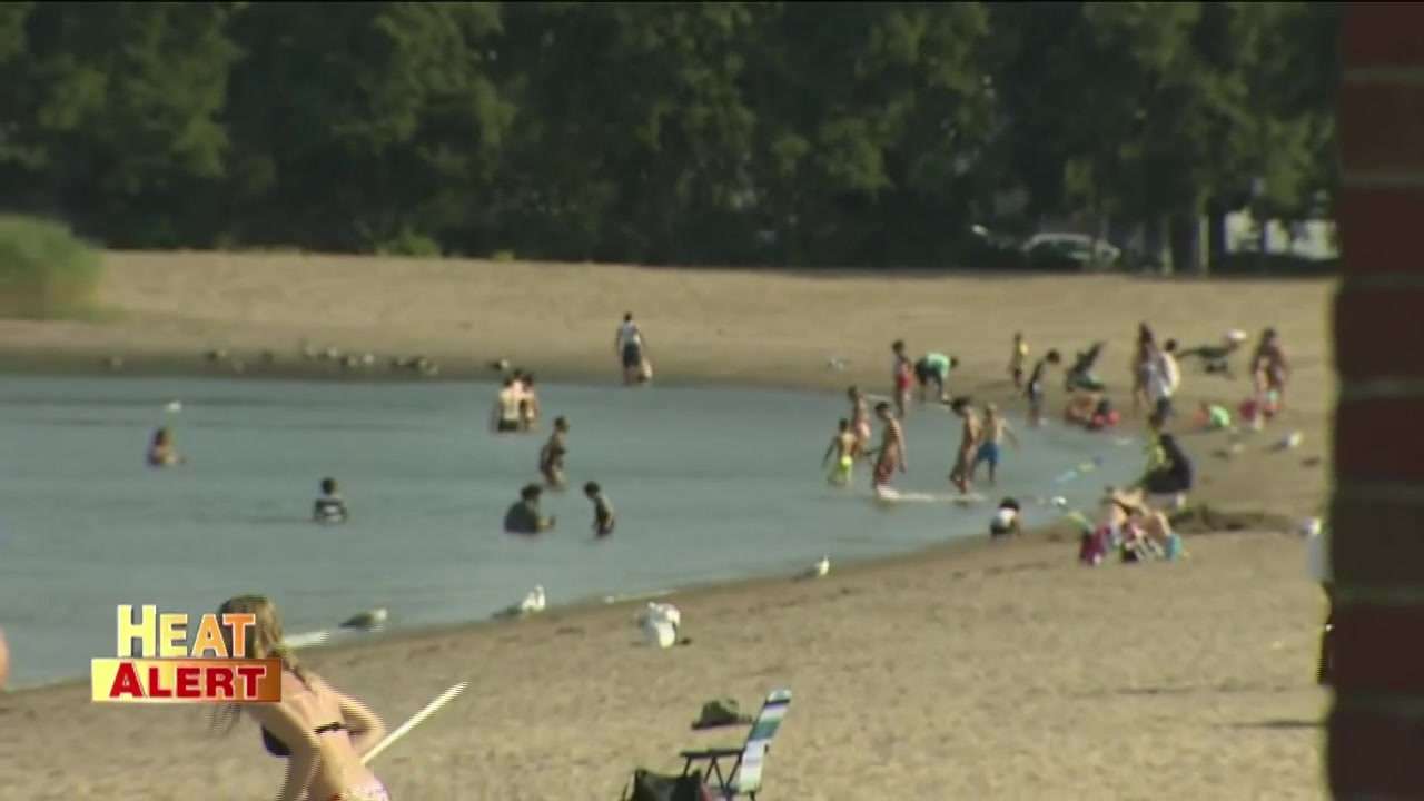 Residents try to beat the record heat at Southie beaches - Boston News ...