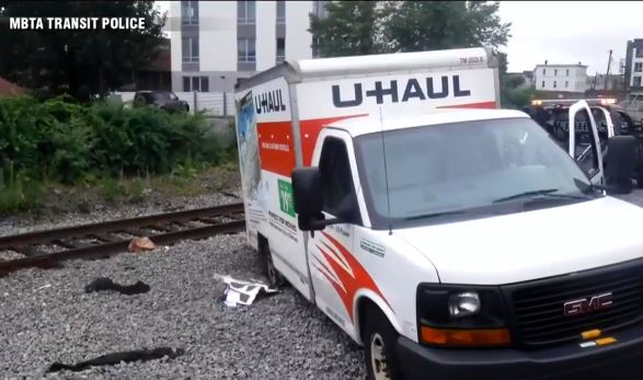 Men charged with illegally dumping trash from U Haul truck in
