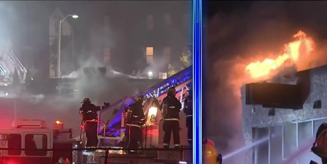 Firefighters battle massive fire threatening Worcester commercial block
