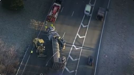 Dump truck rolls over on 495-N in Andover