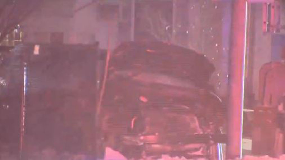 Investigation underway after crash between car, train in Belmont