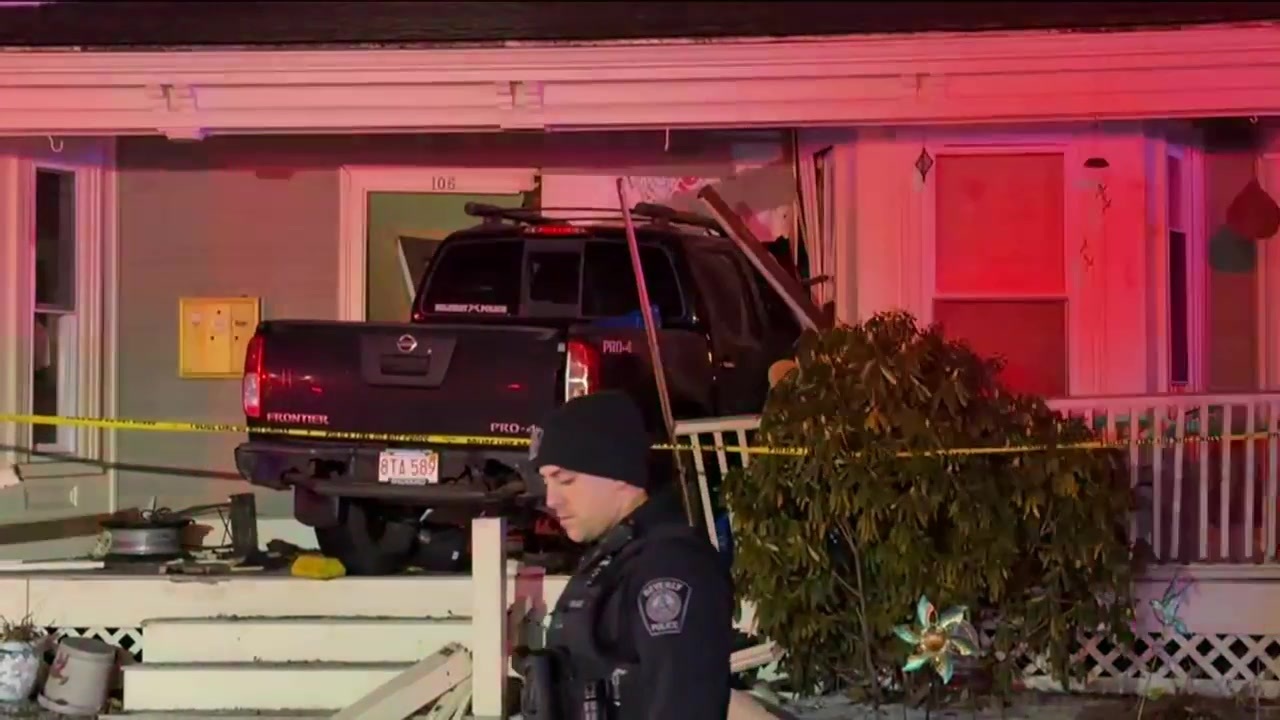 Truck crashes into Beverly house