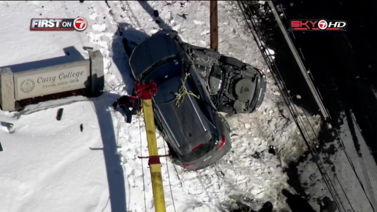 Cars flipped, wedged between utility pole in Milton crash