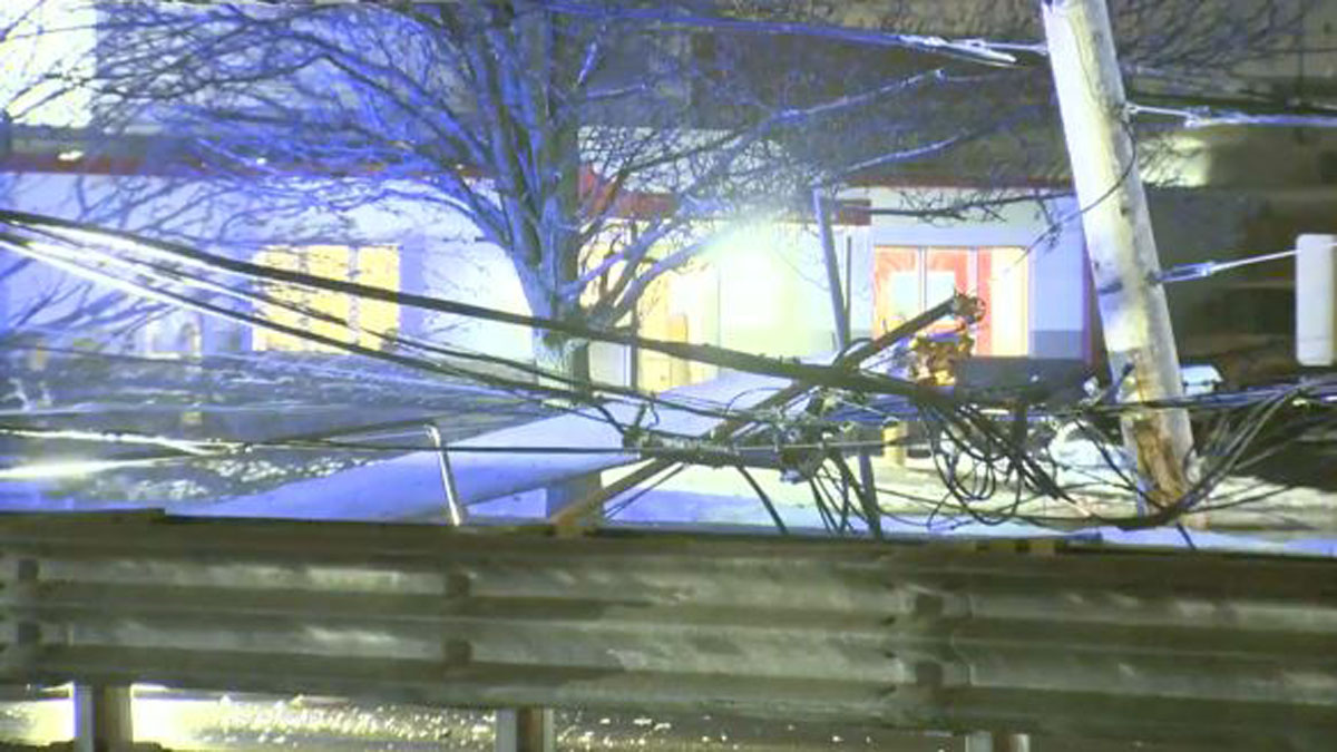 Single-vehicle crash downs utility pole in East Boston