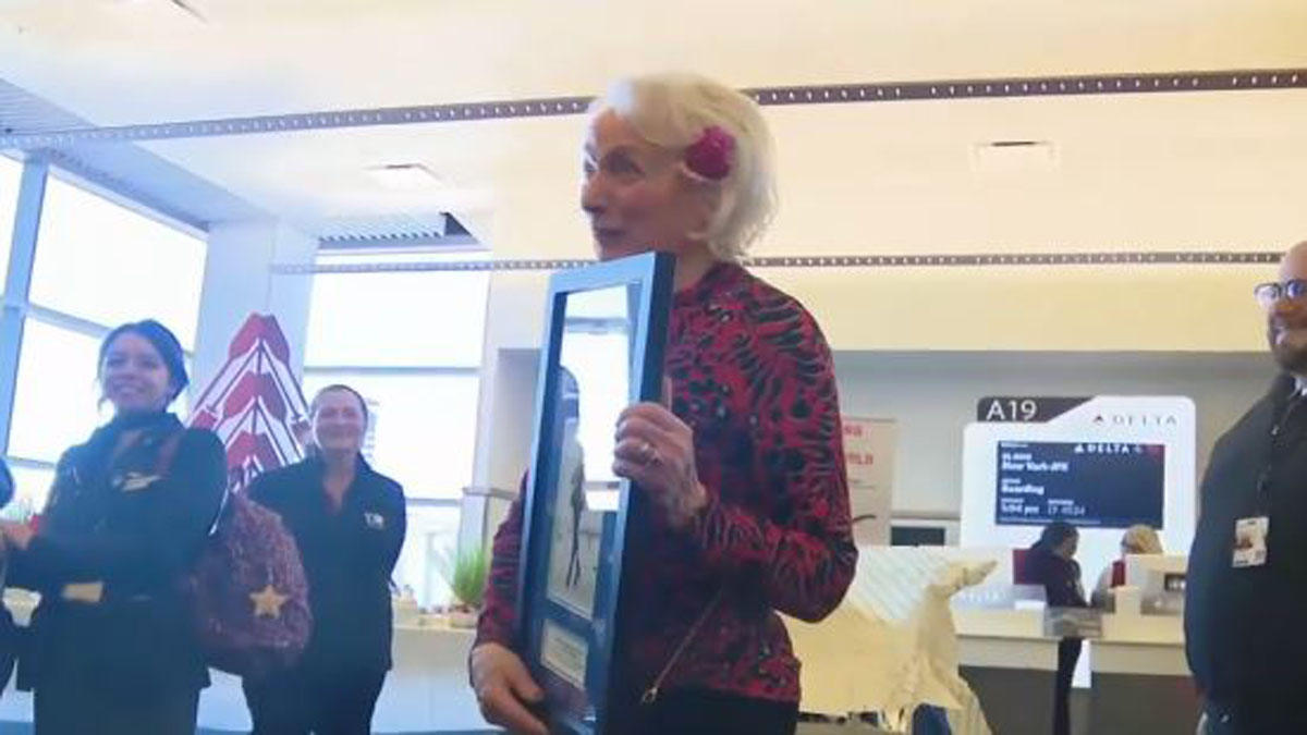 Former figure skater honored at Logan Airport before leaving for Milan to celebrate 70 years since gold medal win