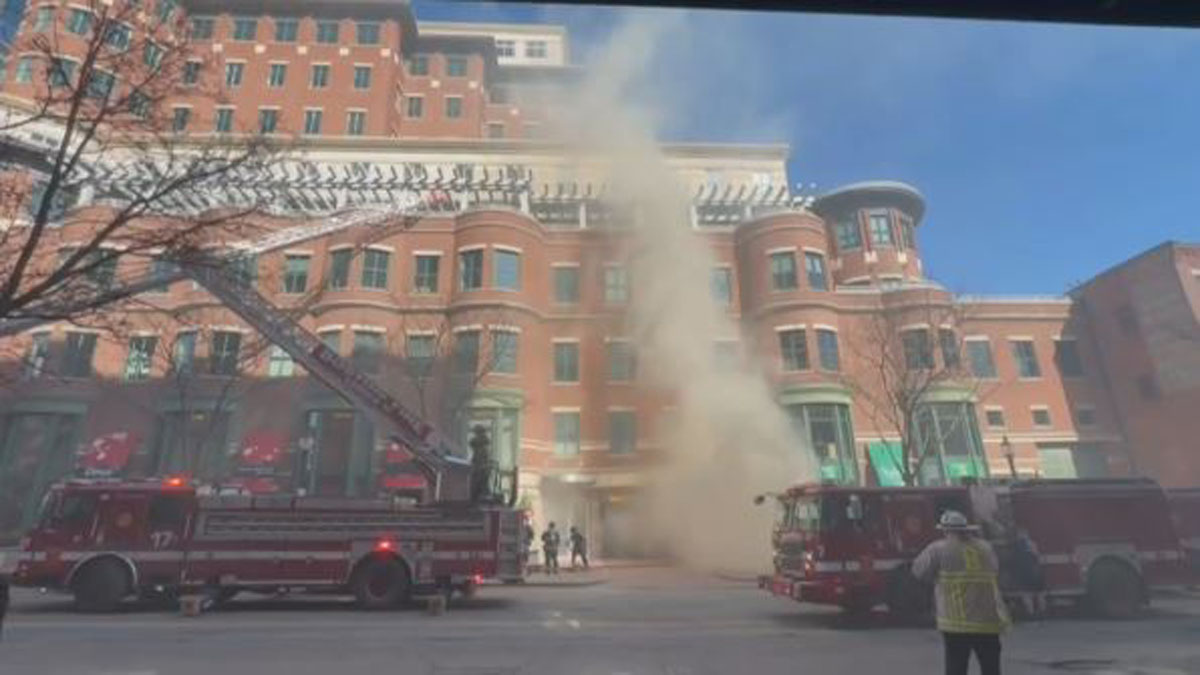 Car goes up in flames in Boston parking garage