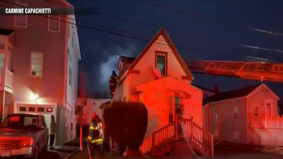 Firefighters battle house fire in Revere
