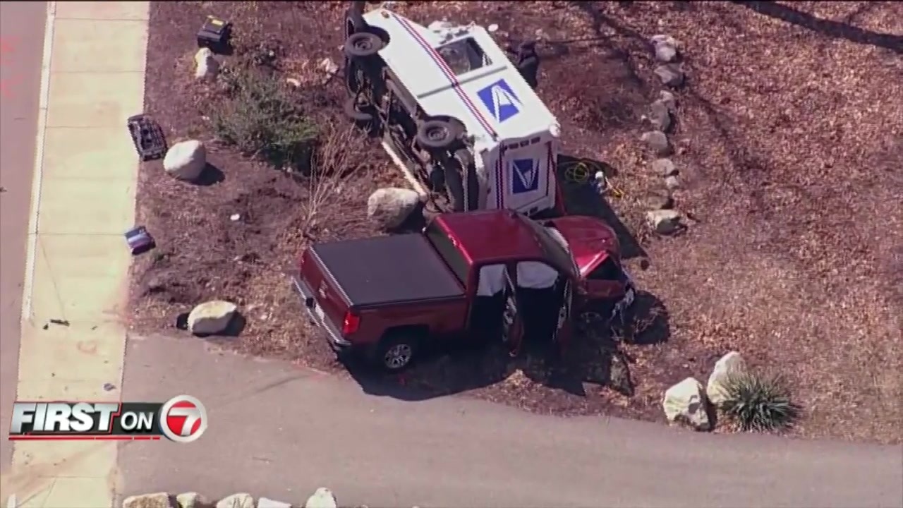 Postal worker trapped under carrier truck after crash in Medway