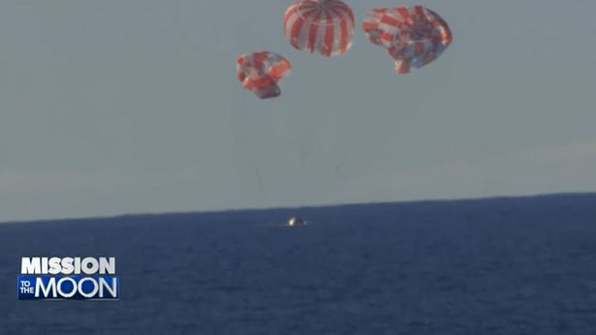 Artemis II’s moon-traveling astronauts return home to cheers after a record-breaking trip