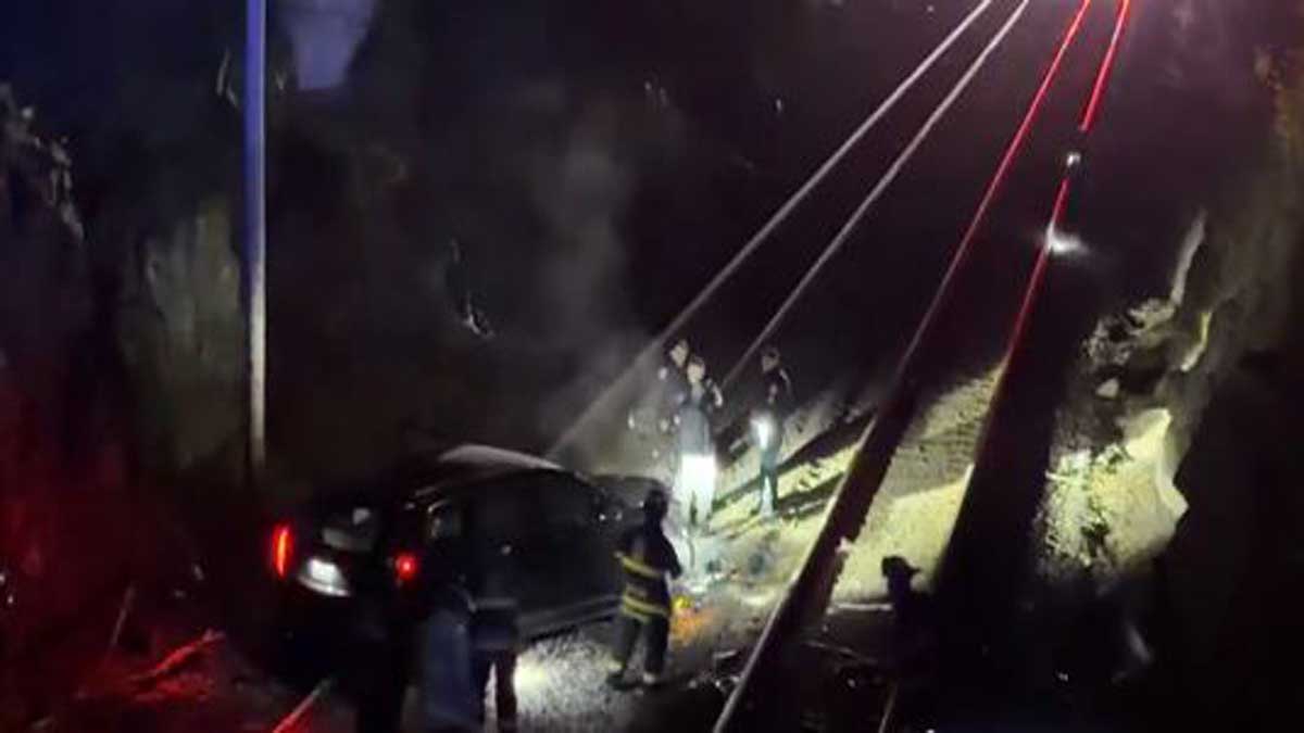 Driver crashes down embankment, onto commuter rail tracks in Beverly