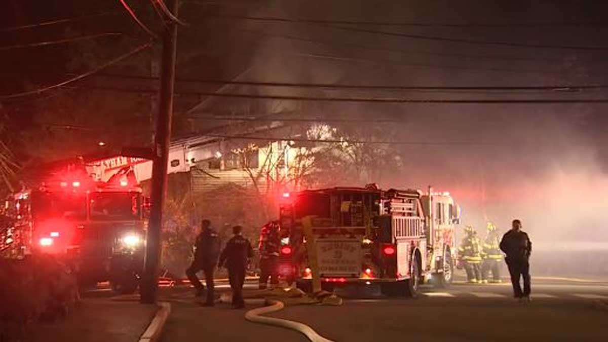 Crews battle house fire in Waltham