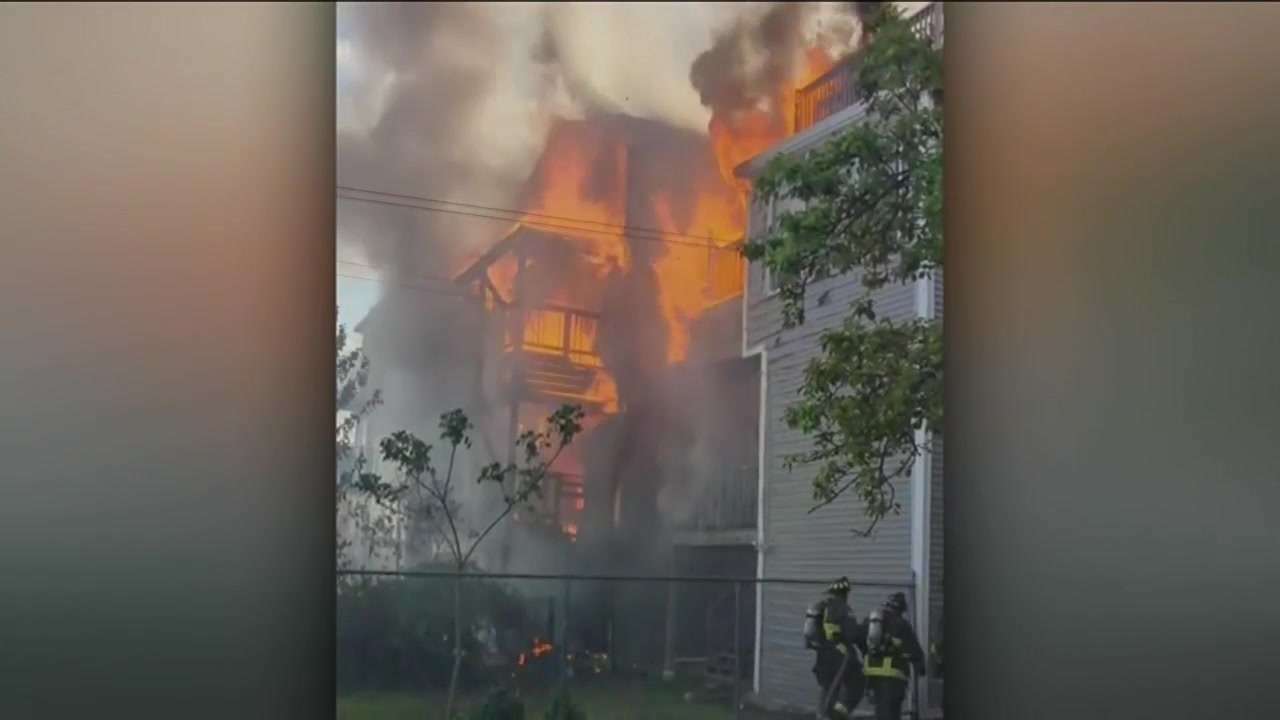 Fast-moving flames tear through multi-family home in East Boston ...