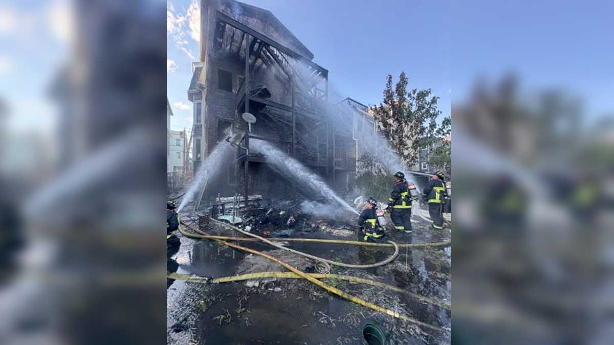 Fire crews battle 4-alarm East Boston blaze that burned multiple buildings