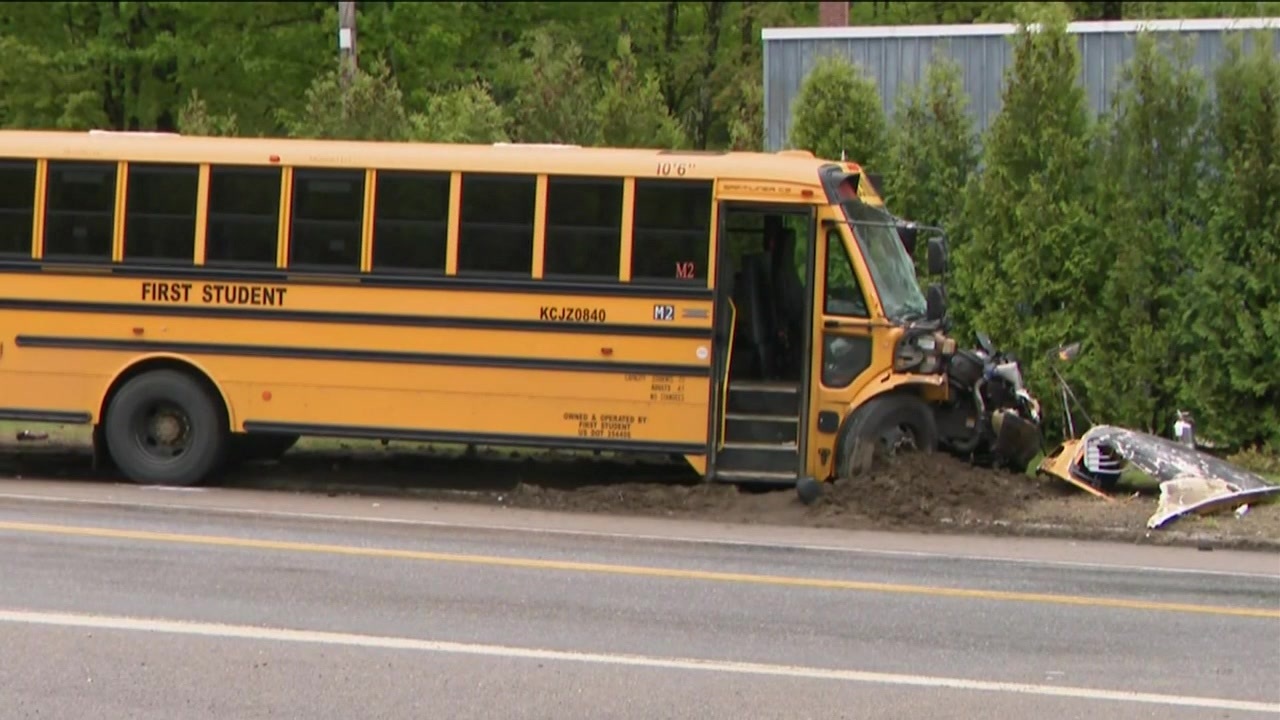 Truck driver killed in crash involving school bus in NH; all 13 students safe