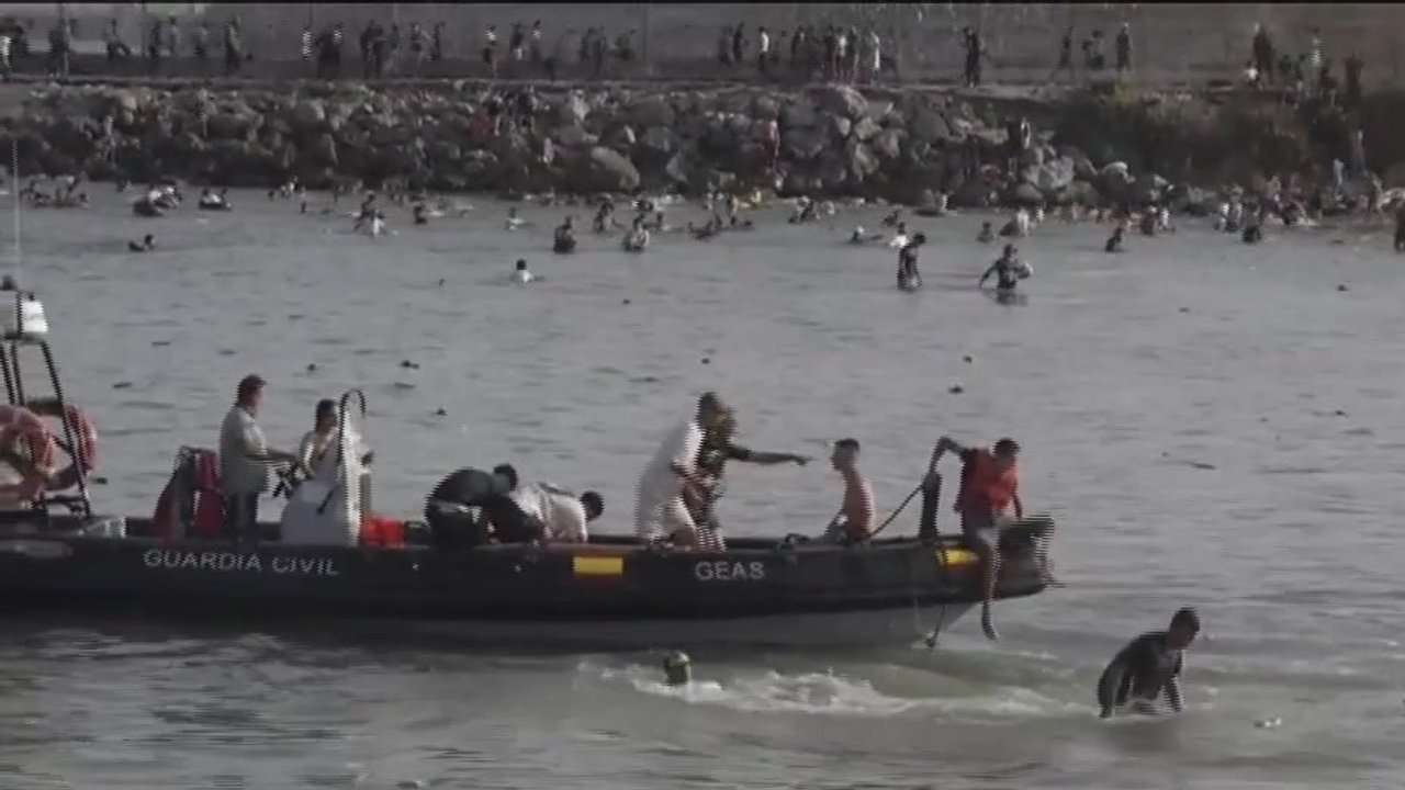 60,000 cross into Spanish territory of Ceuta and at least 34 die after border breach