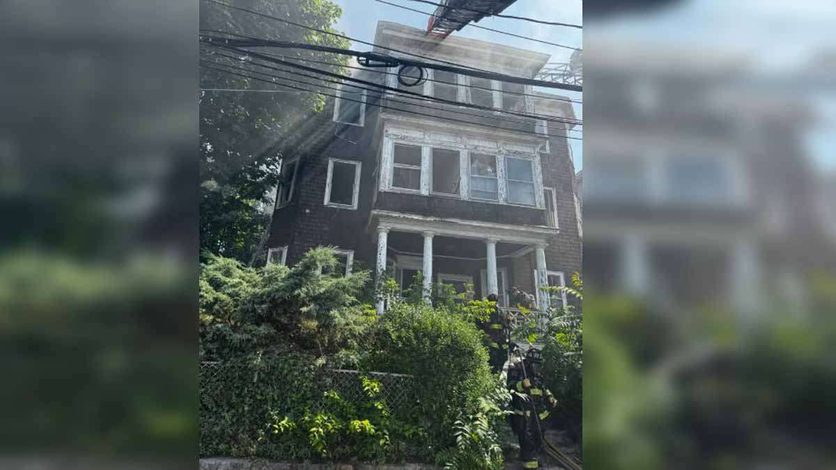 2 firefighters hospitalized after crews battle blaze that torched multi-family home in Savin Hill
