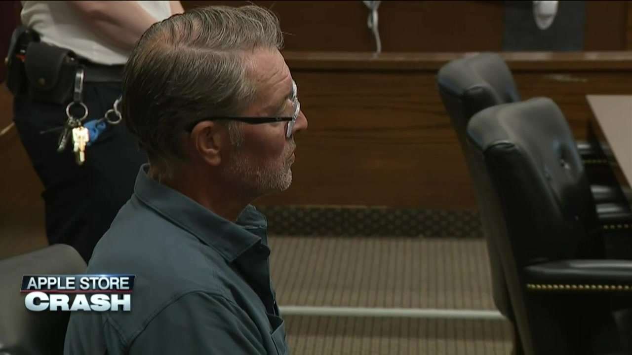Man charged in fatal Apple Store crash arrested, accused of violating terms of r...