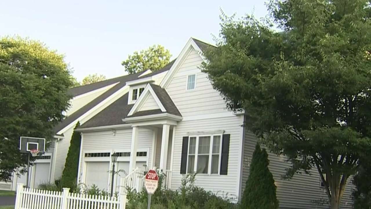 Neighbors react after two people were found dead at a home in Acton