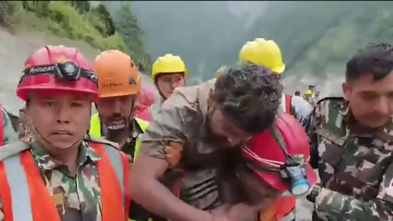 Rescuers pull 2 trapped workers from a hydropower tunnel 9 days after Nepal floods